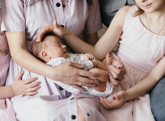 Obraz na płótnie Canvas happy family with a cute newborn baby.