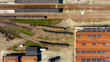 Perpendicular aerial view of Piazza Manzoni train station in Modena, Italy.