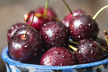 Fresh cherry berries in drops of water