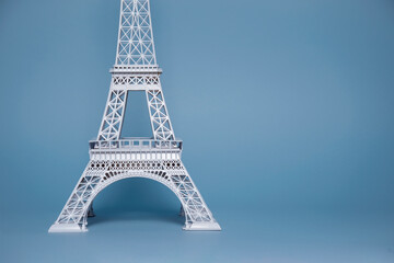 Fototapeta na wymiar Off-centre isolated white Eiffel Tower