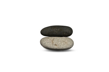 Fototapeta na wymiar Balance of stones. Stones for spa treatments on a white background. The concept of meditation in stones is stacked in a pyramid.