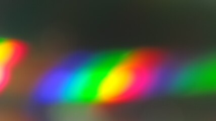 rainbow glow on a dark background © TK_Office