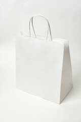 Paper bag on white background with copy space
