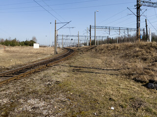Fototapeta na wymiar Side, single railroad track, with electric traction.