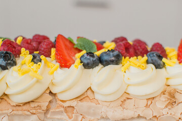 Dessert with raspberries, strawberries and mint. Close-up. View from above