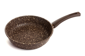 stylish modern frying pan with brown non-stick coating and brown handle on isolated background