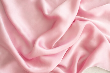 close up of silk satin texture-  pink natural tone
slow fashion concept 