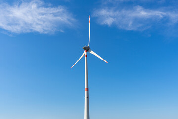 wind turbine against blue sky