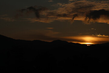 sunset with mountain silhouette