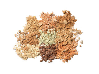 Dry crushed color eye shadows as samples of cosmetic product isolated on white
