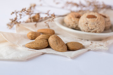 Almendrados, dumplings or typical biscuits made from almonds, sugar and Egg whites. Almond cakes on white background.