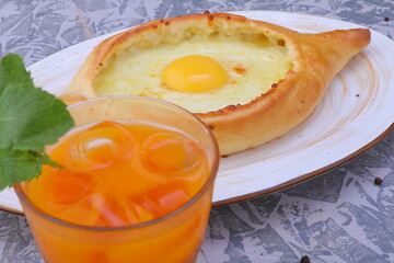 the national Georgian dish khachapuri and khinkali on the table in plates and lamb kebab