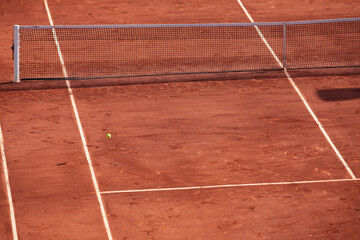 Fragment of clay tennis court. Grid and marking lines visible. Selective focus, design element