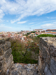 Fototapeta na wymiar Ramparts, Defensive Walls And Towers In São Jorge Castle or Saint George Castle) overlooking the center of Lisbon, Portugal, Europe