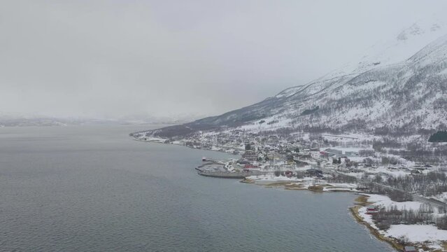 View of Olderdalen town covered in snow from over Kaafiord; aerial