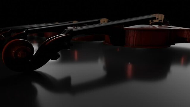 Violins in dark room, Video for Store or Workshop. Beautiful looped seamless footage with many fiddles lying in row.
