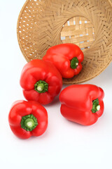 Red colour pepper or bell pepper or Capsicum in bamboo basket ,selective focus