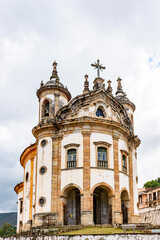 Fototapeta na wymiar Facade of famous historic baroque church in Ouro Preto city in Minas Gerais, Brazil