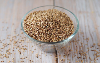 Sesame seeds in a small glass bowl	