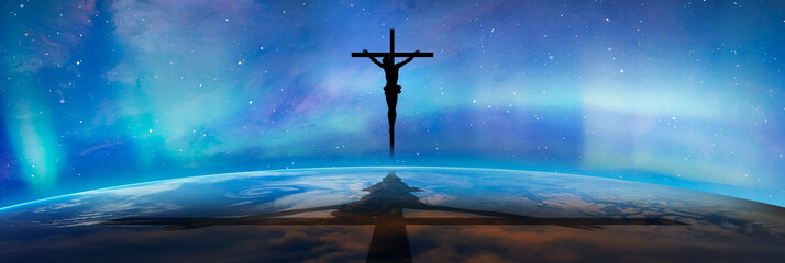 Jesus on the cross over the clouds with aurora borealis (Northern lights), jesus shadow on the...