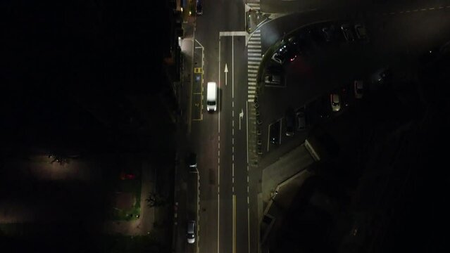 aerial view of street with drone 4k at night city of como italy
