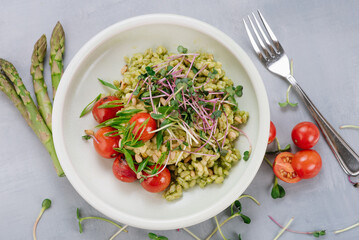 Pearl barley dish with cherry tomatoes and microgreens. Diet menu
