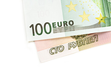 Russian rouble and euro banknotes on white background. World economy crisis background