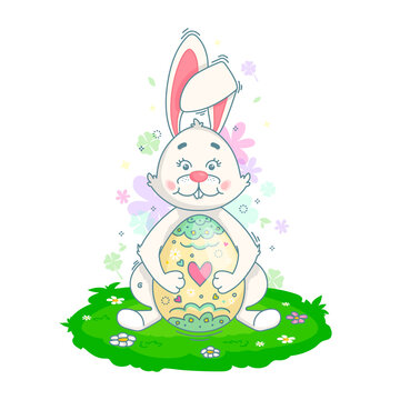 A white rabbit sits on a lawn and hugs a large colored Easter egg. Vector linear illustration. Character for the traditional Easter holiday.
