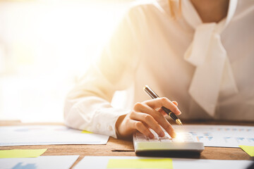 The financiers are calculating personal taxes for their customers.