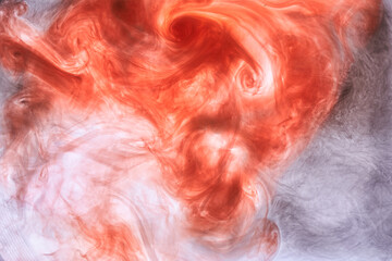 Orange pink smoke background, colorful fog, abstract swirling ink ocean sea, acrylic paint pigment underwater