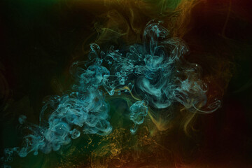 Multicolored dark smoke on black ink background, colorful fog, abstract swirling touch ocean sea, acrylic pigment paint underwater © amixstudio