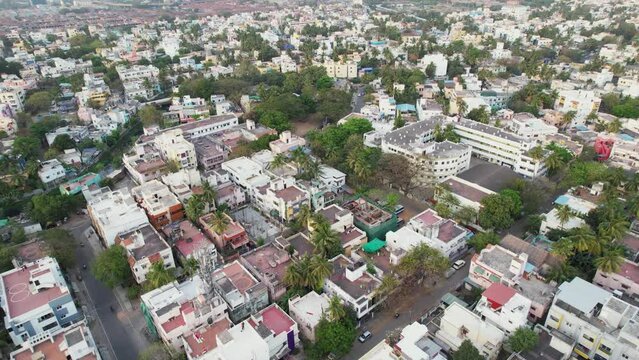 Posh are of Indian City on a aerial view with school and houses.