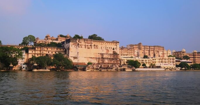 Udaipur City Palace view from lake Pichola. Rajput architecture of Mewar dynasty rulers of Rajasthan. Udaipur, India