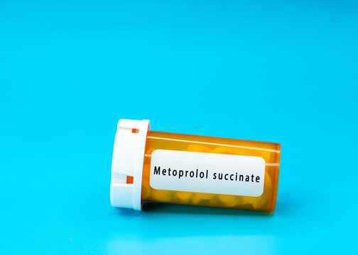 Metoprolol succinate  Medical vial with pills. Medical pills in orange Plastic Prescription. most popular medicine