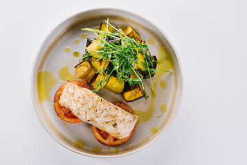 Vegetarian dish of zucchini, broccoli and greens