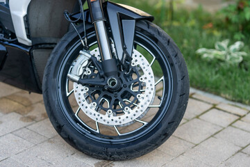 A motorcycle standing in the street