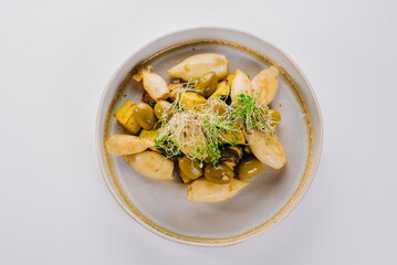 Dietary dish of squids, olives and greens