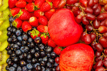 Fresh fruits concept, Healthy fruits consist of grapes apple orange and berry as background