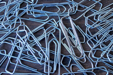paper clips onwooden background