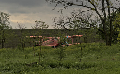 An old biplane is located near a small Bessarabian village. Ukrainian biplane aircraft designed by...