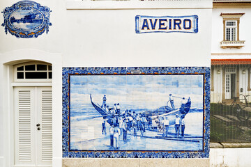 typical blue azulejos tiles which tells a story of life on the facade of the old railways station...