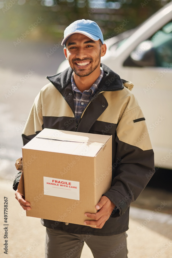 Poster ive got your delivery right here. shot of a delivery man loading boxes into a vehicle.