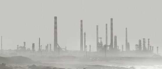 Oil refinery in the middle of fog