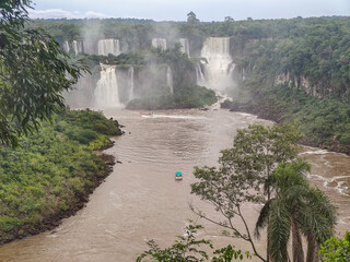 view of the iguaçu falls with macuco safari boat. Iguaçu Falls is a set of about 275 waterfalls on the Iguaçu River.