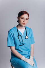 Woman doctor with stethoscope and x-ray on isolated background. Protection, epidemic, medicine, health care lifestyle concept