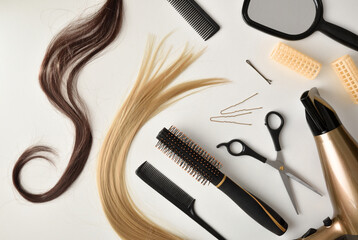 Tools for hair cutting and styling on white table top