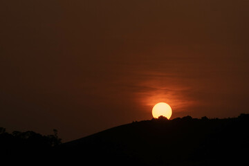 Fototapeta na wymiar Sunrise, Sunset, mountain, Forest, Horizon, Golden hour, orange sky, clouds, evening, morning