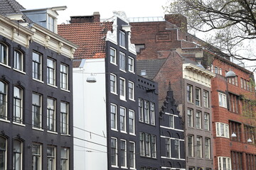 Fototapeta premium Amsterdam Nieuwezijds Voorburgwal Street Traditional Building Facades View, Netherlands
