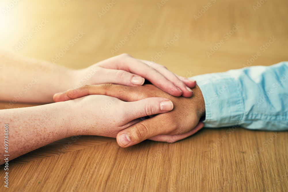 Poster help - sometimes we need it, sometimes we give. cropped shot of a man and woman holding hands in com