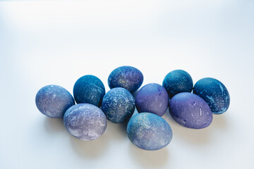 Space colored eggs on white background.